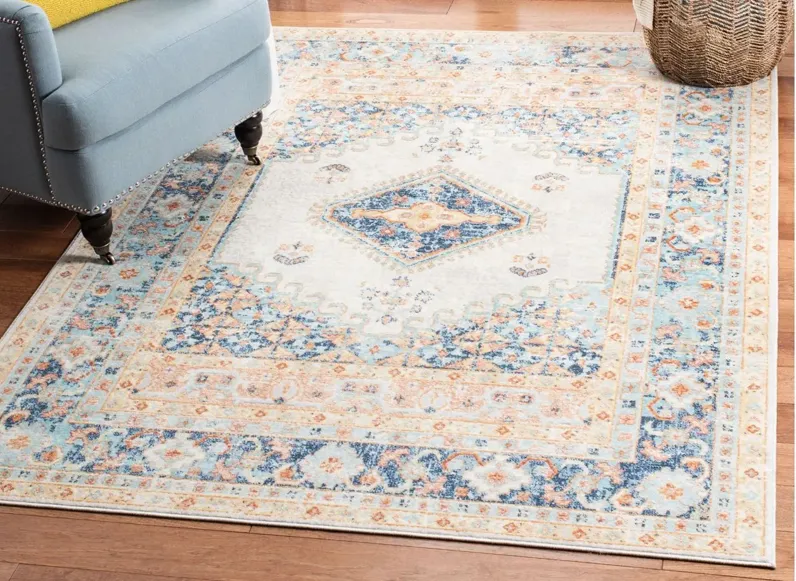 Audrianna Area Rug in Ivory / Navy by Safavieh