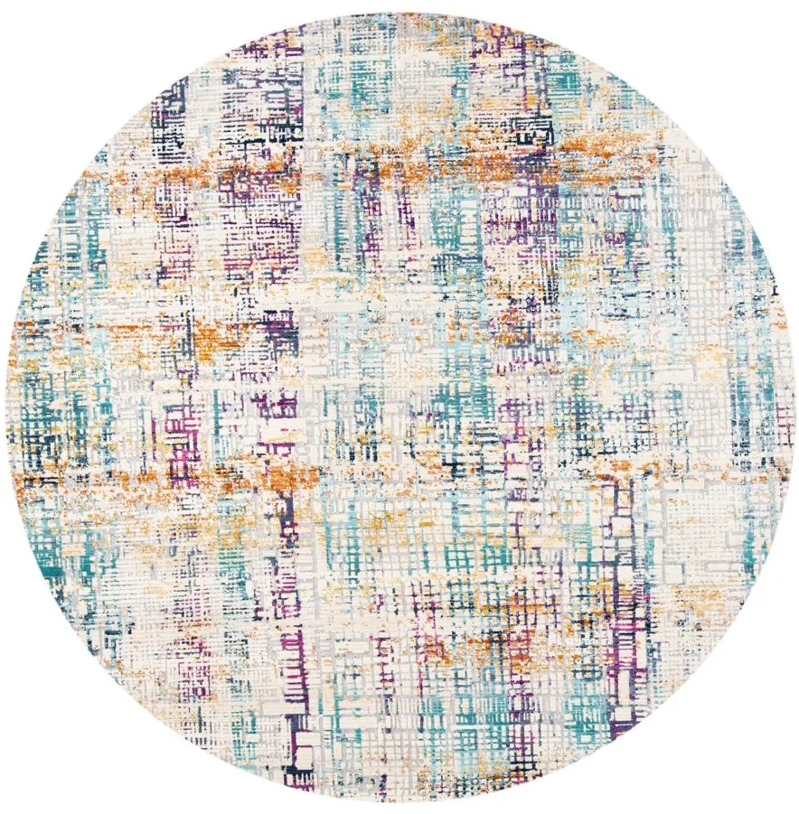 Ahnka Area Rug in Ivory / Turquoise by Safavieh