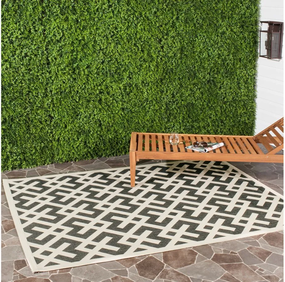 Courtyard Crossing Indoor/Outdoor Area Rug in Black & Beige by Safavieh