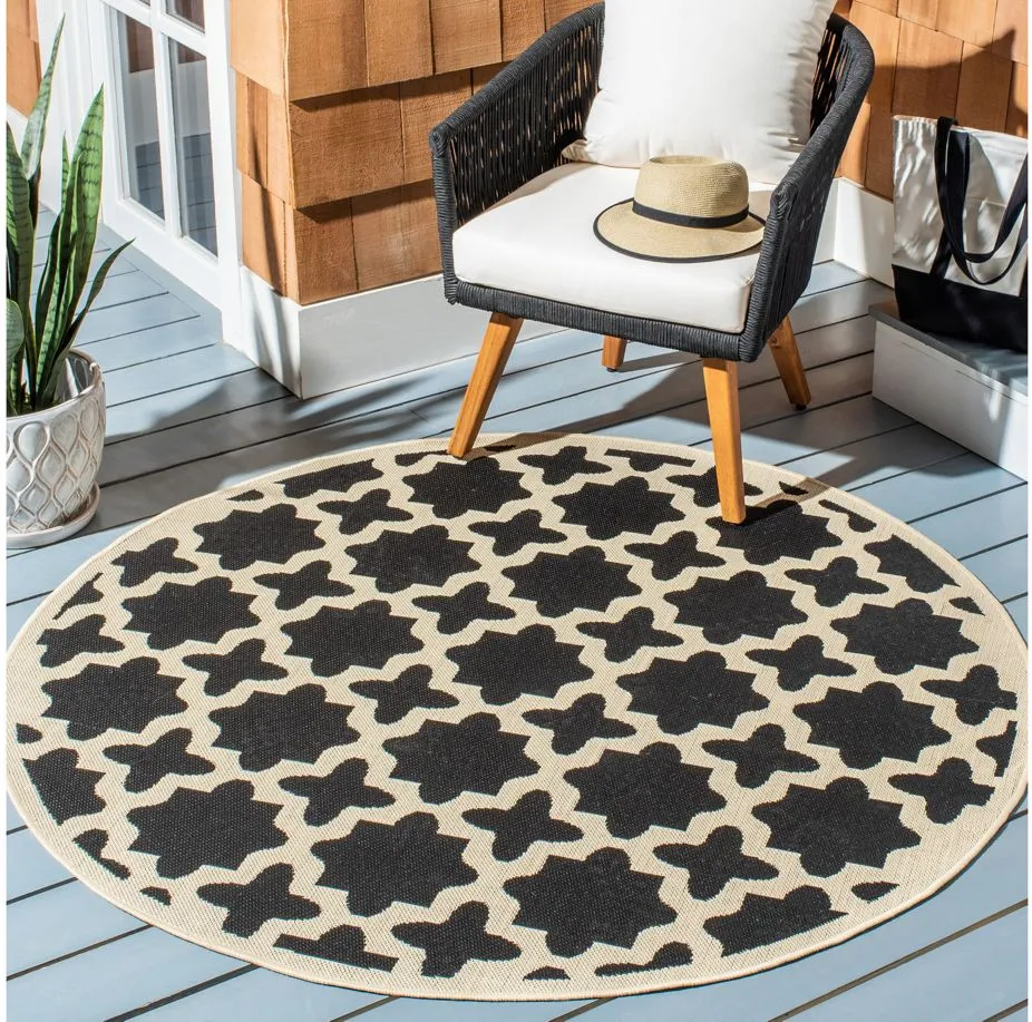 Courtyard Tile Indoor/Outdoor Area Rug Round in Black & Beige by Safavieh