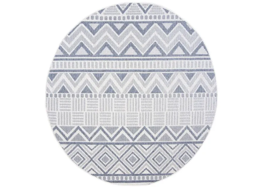 Bermuda Geometric Indoor/Outdoor Round Area Rug in Cream & Navy by Safavieh