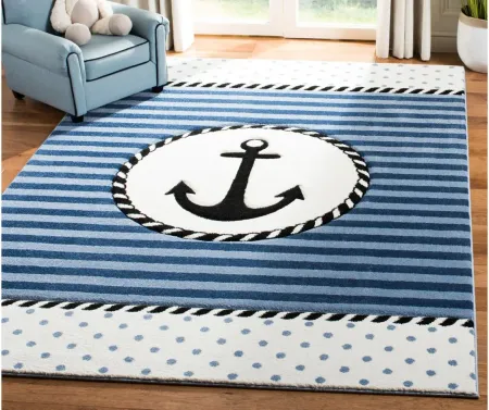 Carousel Anchor Kids Area Rug in Navy & Ivory by Safavieh