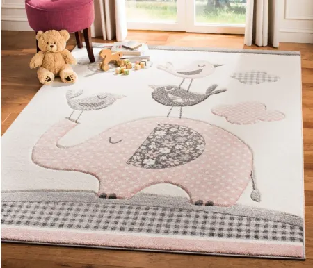 Carousel Elephant Kids Area Rug in Pink & Ivory by Safavieh