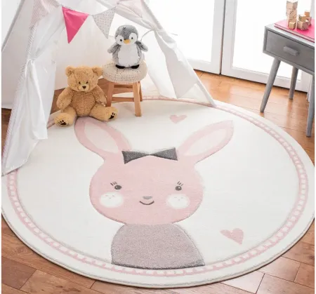 Carousel Bunny Kids Area Rug Round in Ivory & Pink by Safavieh