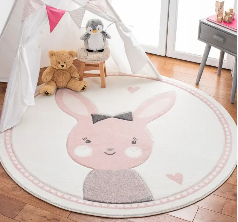 Carousel Bunny Kids Area Rug Round in Ivory & Pink by Safavieh