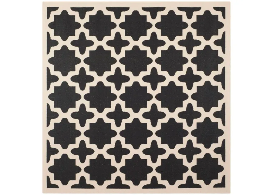 Courtyard Tile Indoor/Outdoor Area Rug in Black & Beige by Safavieh