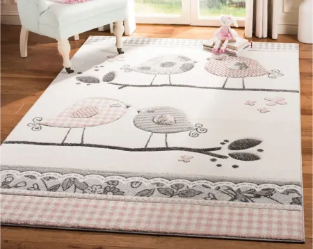 Carousel Birds Kids Area Rug in Pink & Ivory by Safavieh