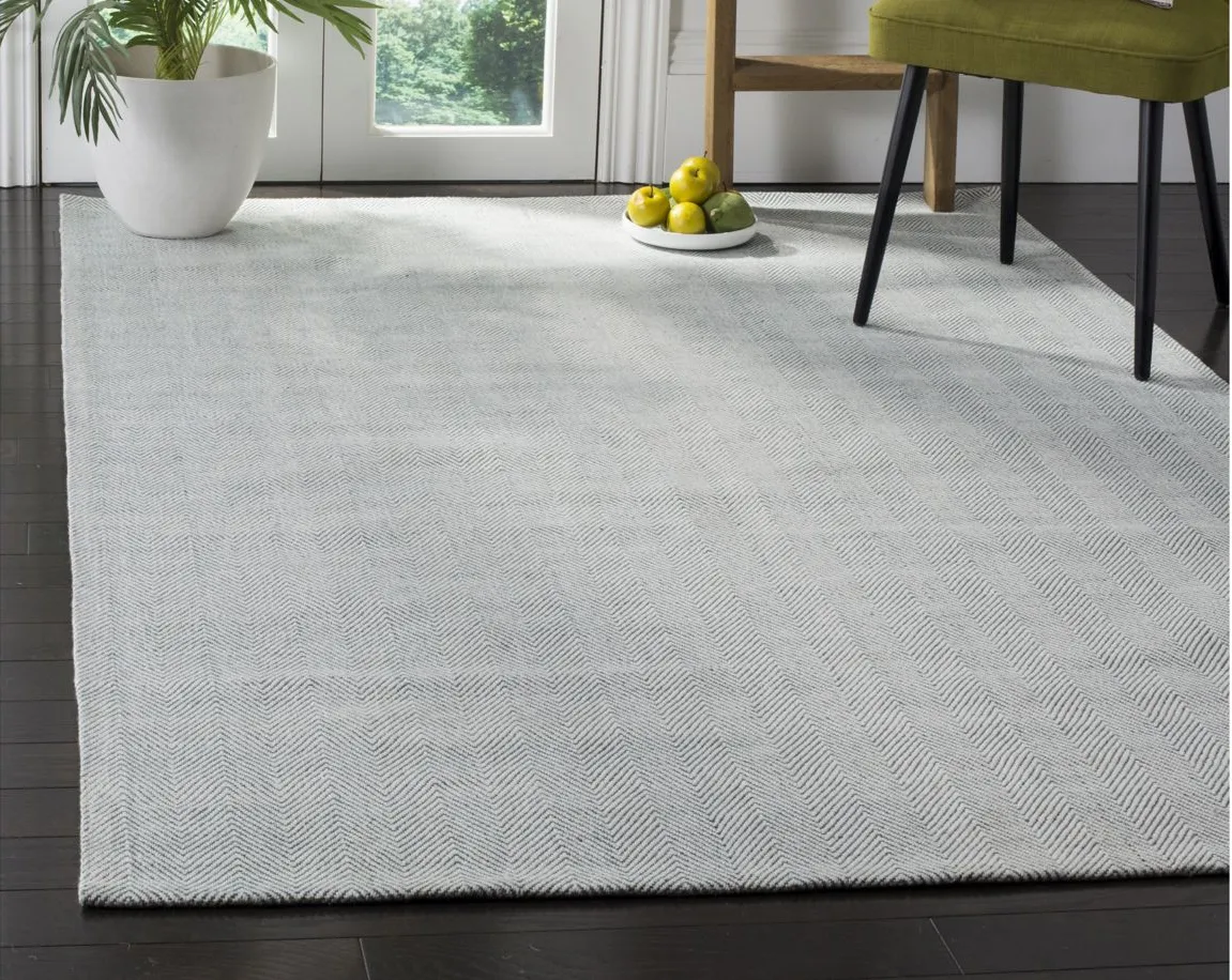 Marbella IV Area Rug in Light Blue by Safavieh