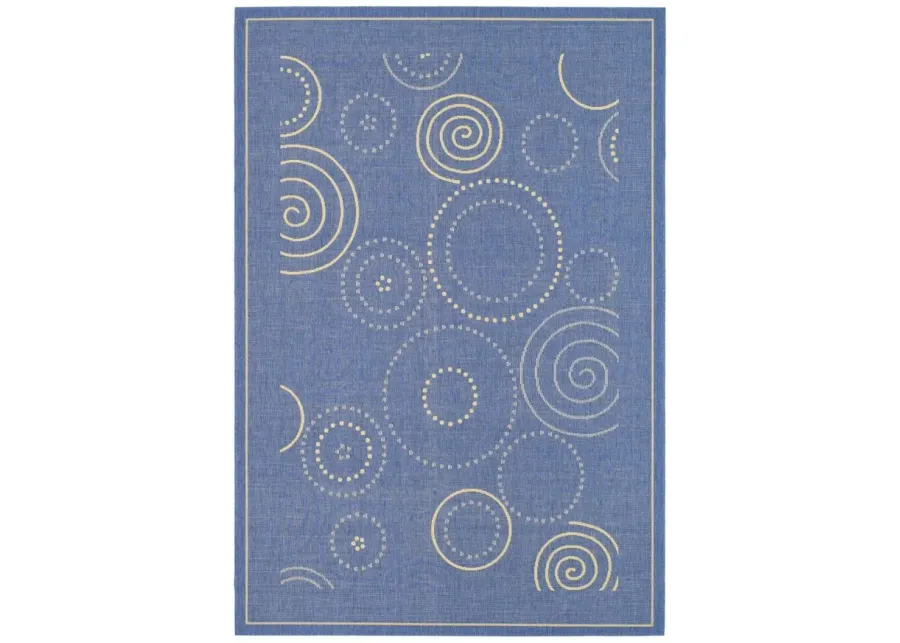 Courtyard Circles Indoor/Outdoor Area Rug in Blue & Natural by Safavieh