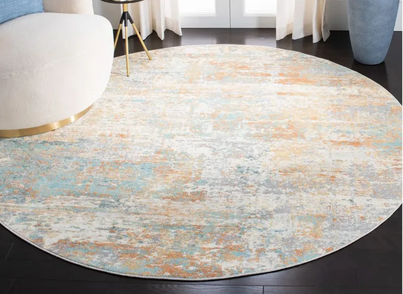 Aoife Area Rug in Ivory / Aqua by Safavieh