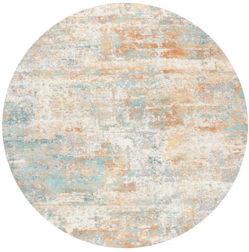 Aoife Area Rug in Ivory / Aqua by Safavieh