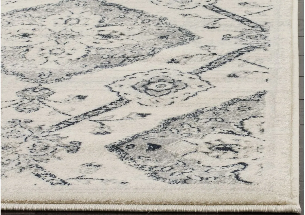 Carnegie Area Rug in Cream / Light Gray by Safavieh