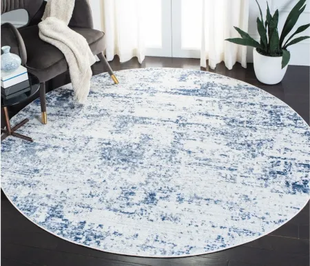 Amelia Area Rug in Ivory / Navy by Safavieh