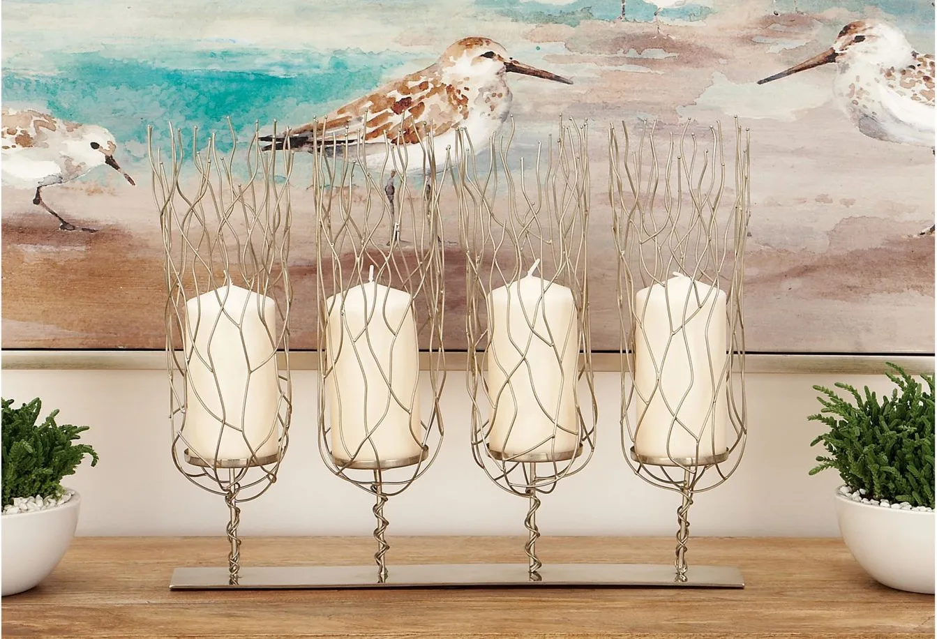 Ivy Collection Gnaeus Candle Holder in Silver by UMA Enterprises