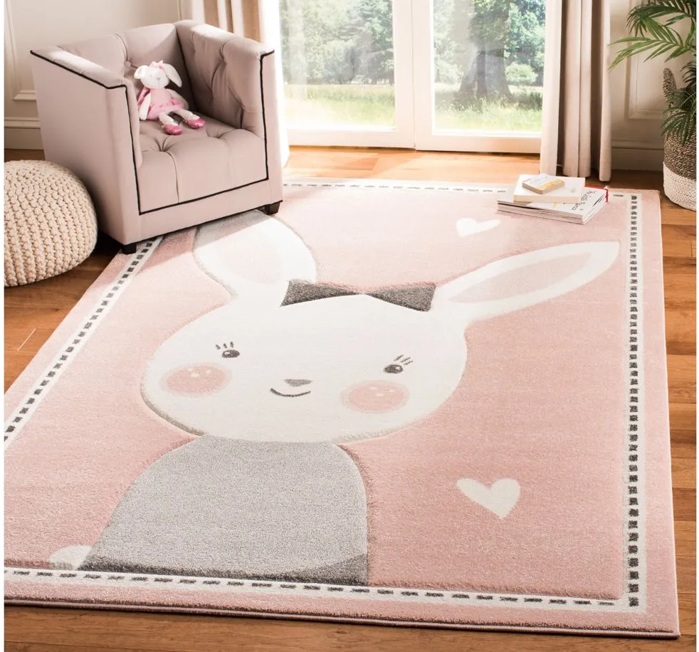 Carousel Bunny Kids Area Rug in Pink & Ivory by Safavieh