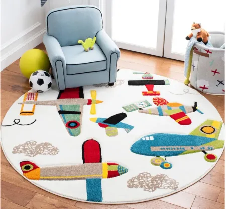 Carousel Planes Kids Area Rug Round in Ivory & Blue by Safavieh
