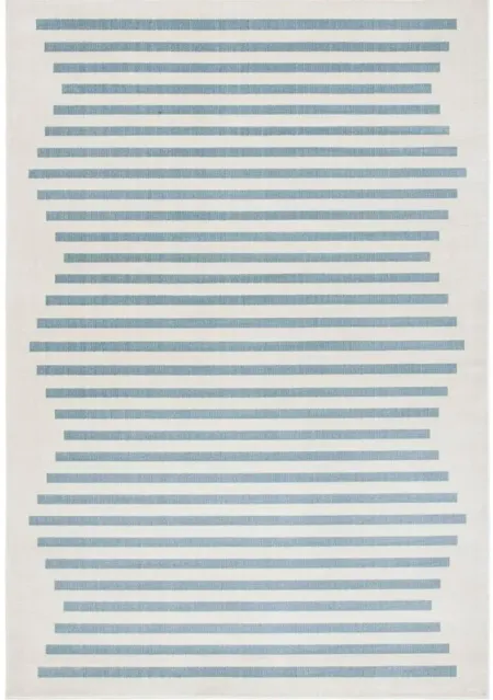 Ornelle Area Rug in Ivory/Blue by Safavieh