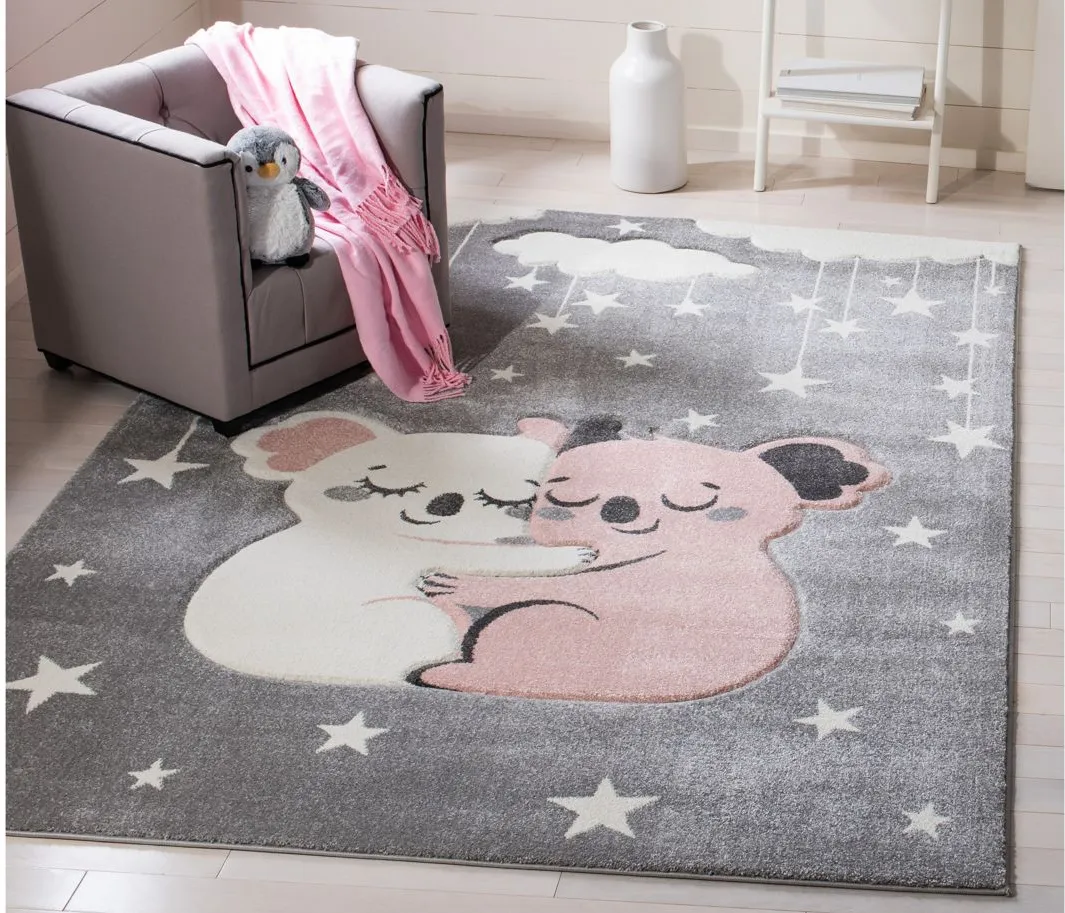 Carousel Koala Kids Area Rug in Gray & Ivory by Safavieh