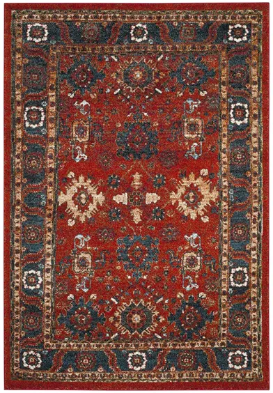 Avicenna Orange Area Rug in Orange & Blue by Safavieh