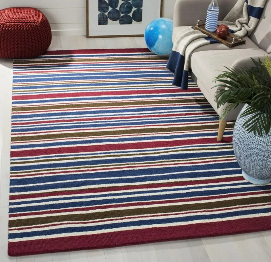 Zhi Kid's Rug in Ivory/Multi by Safavieh