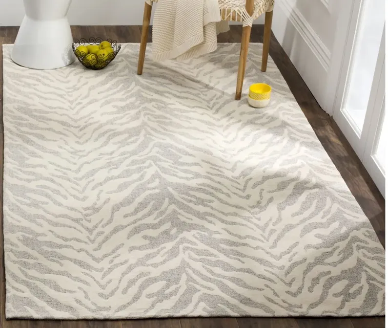 Marbella III Area Rug in Light Grey/Ivory by Safavieh