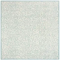Marbella IV Area Rug in Ivory/Turquoise by Safavieh