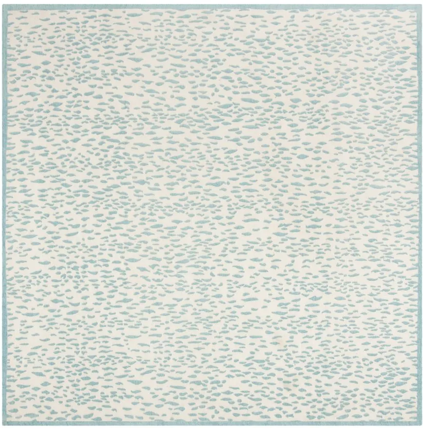 Marbella IV Area Rug in Ivory/Turquoise by Safavieh