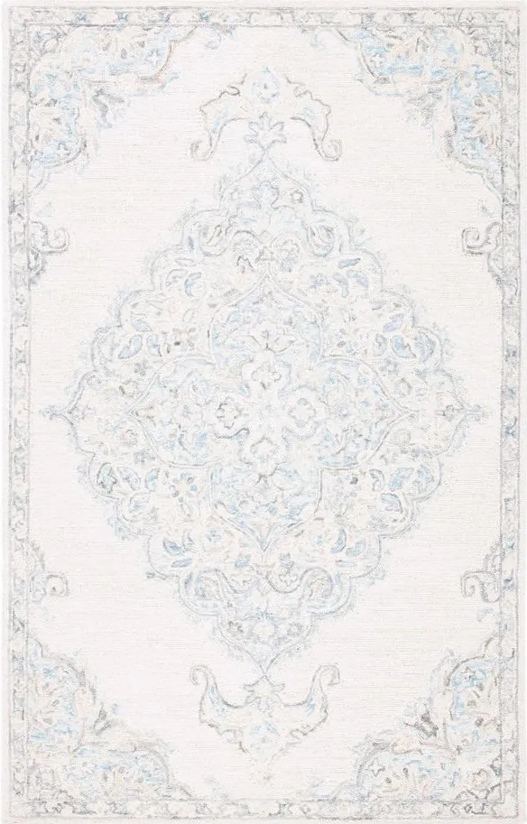 Drummond Area Rug in Ivory & Blue by Safavieh
