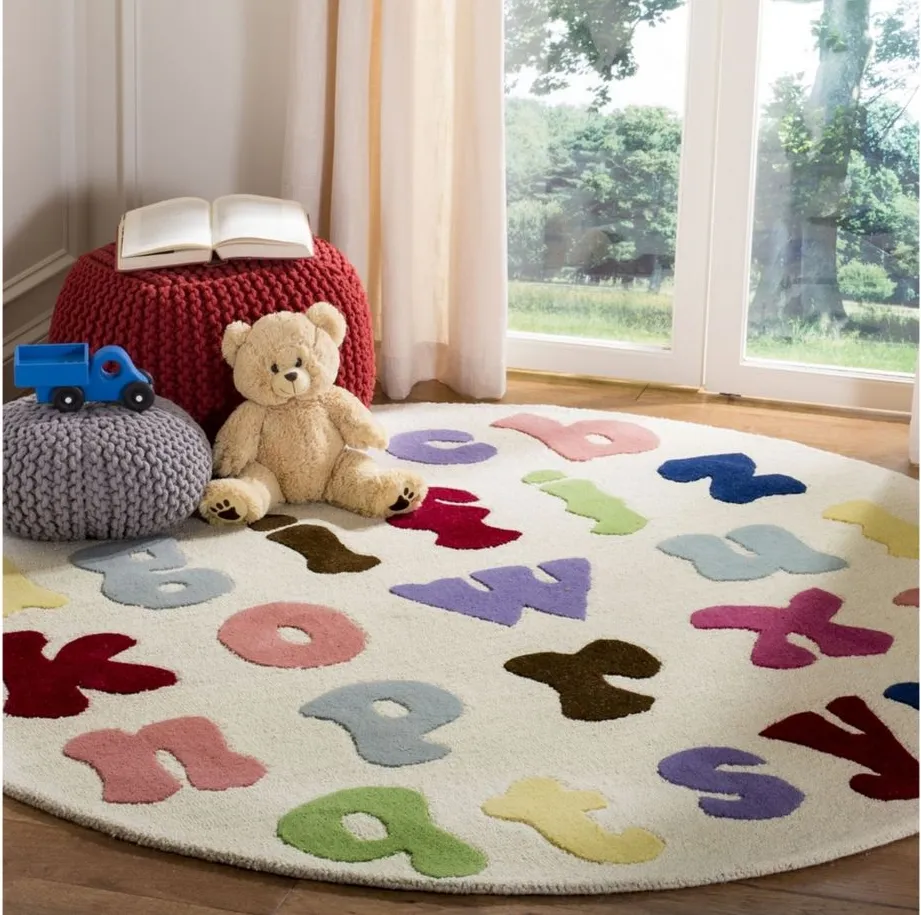 MacTavish Kid's Rug in Ivory/Multi by Safavieh