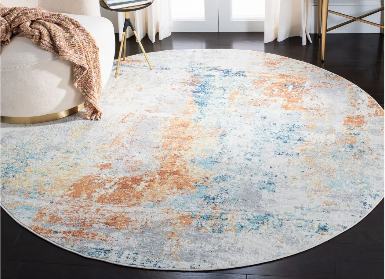 Agnella Area Rug in Ivory / Rust by Safavieh