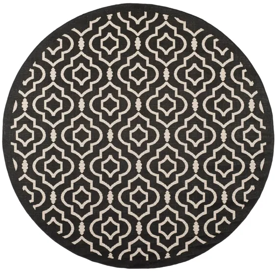 Courtyard Key Indoor/Outdoor Area Rug Round in Black & Beige by Safavieh