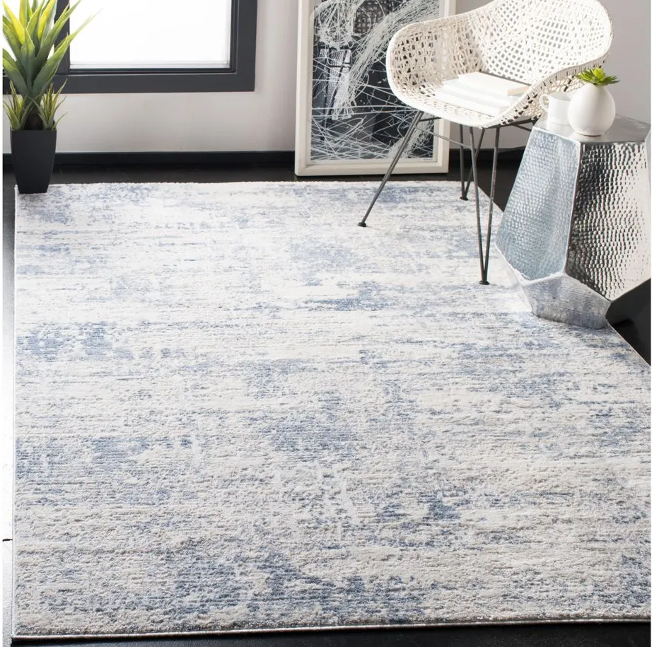 Amelia Area Rug in Ivory / Blue by Safavieh