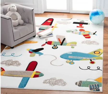 Carousel Planes Kids Area Rug in Ivory & Blue by Safavieh