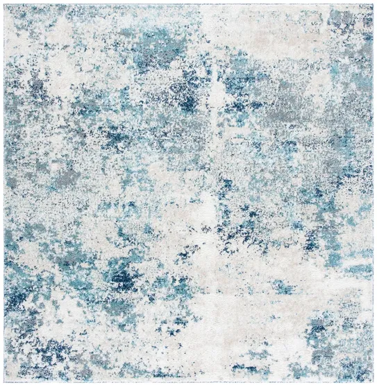 Iommi Area Rug in Ivory & Blue by Safavieh