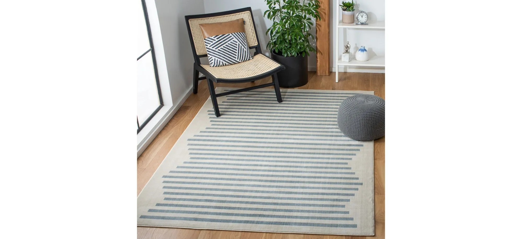 Ornelle Area Rug in Ivory/Blue by Safavieh