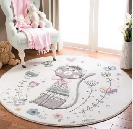 Carousel Cat Kids Area Rug Round in Ivory & Pink by Safavieh