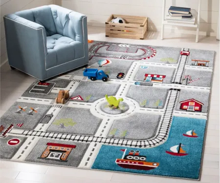 Carousel Cars Kids Area Rug in Gray & Ivory by Safavieh