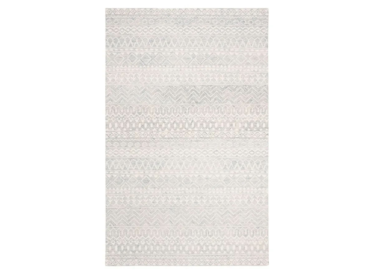 Kazuma Area Rug in Aqua & Ivory by Safavieh