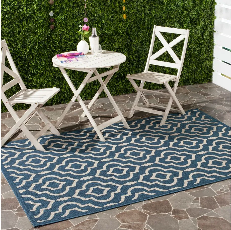 Courtyard Key Indoor/Outdoor Area Rug in Navy & Beige by Safavieh