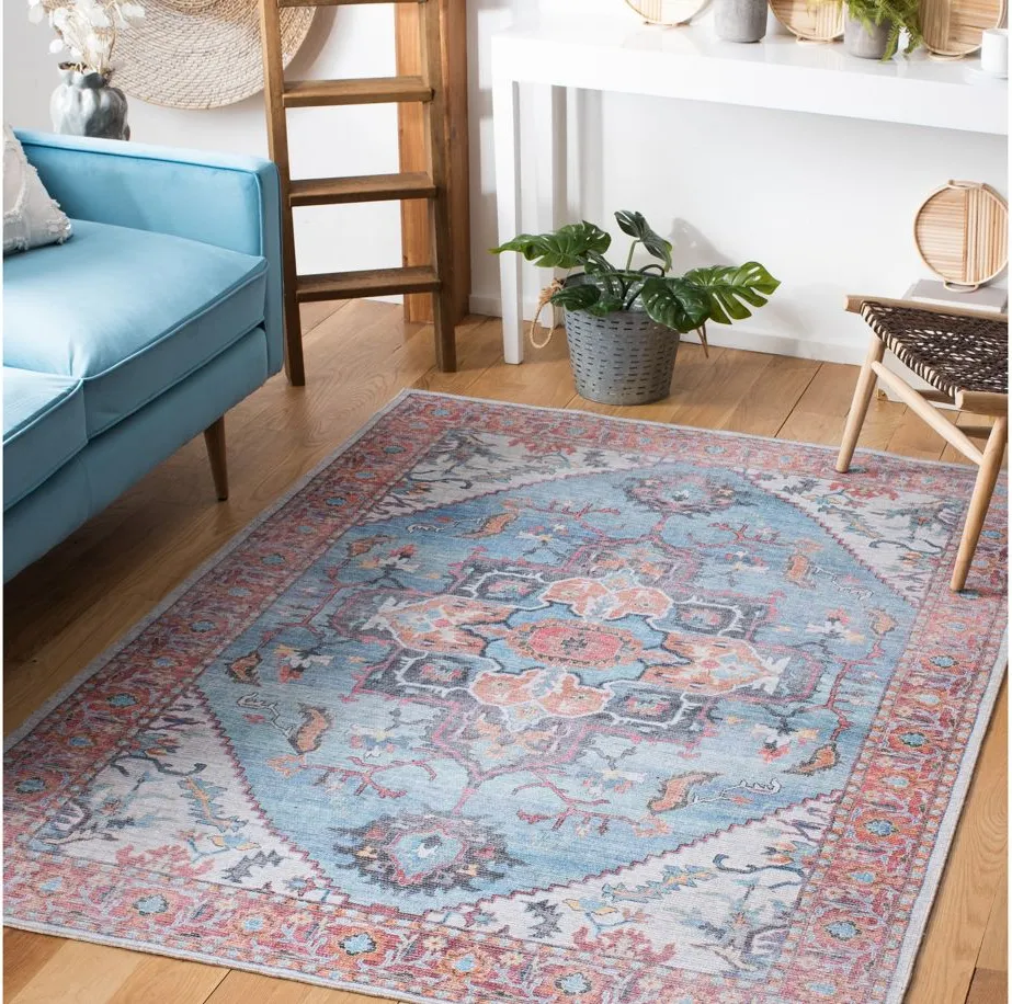 Serapi Area Rug in Blue & Ivory by Safavieh