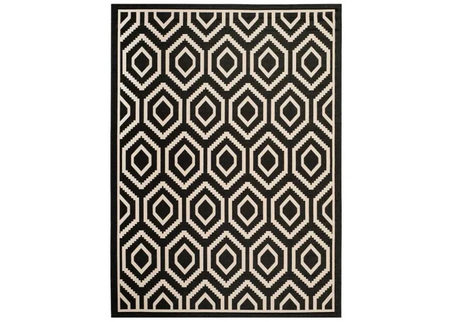 Courtyard Diamonds Indoor/Outdoor Area Rug in Black & Beige by Safavieh