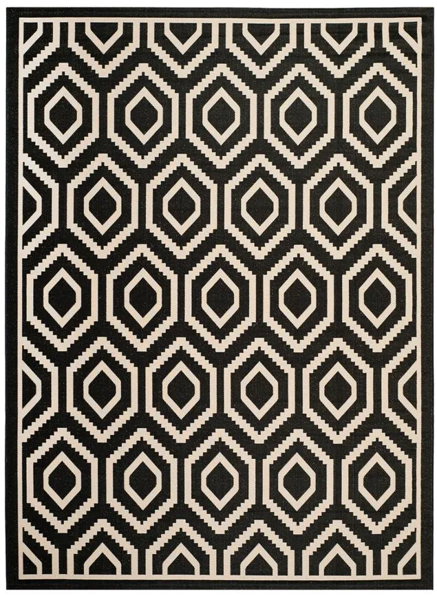 Courtyard Diamonds Indoor/Outdoor Area Rug in Black & Beige by Safavieh