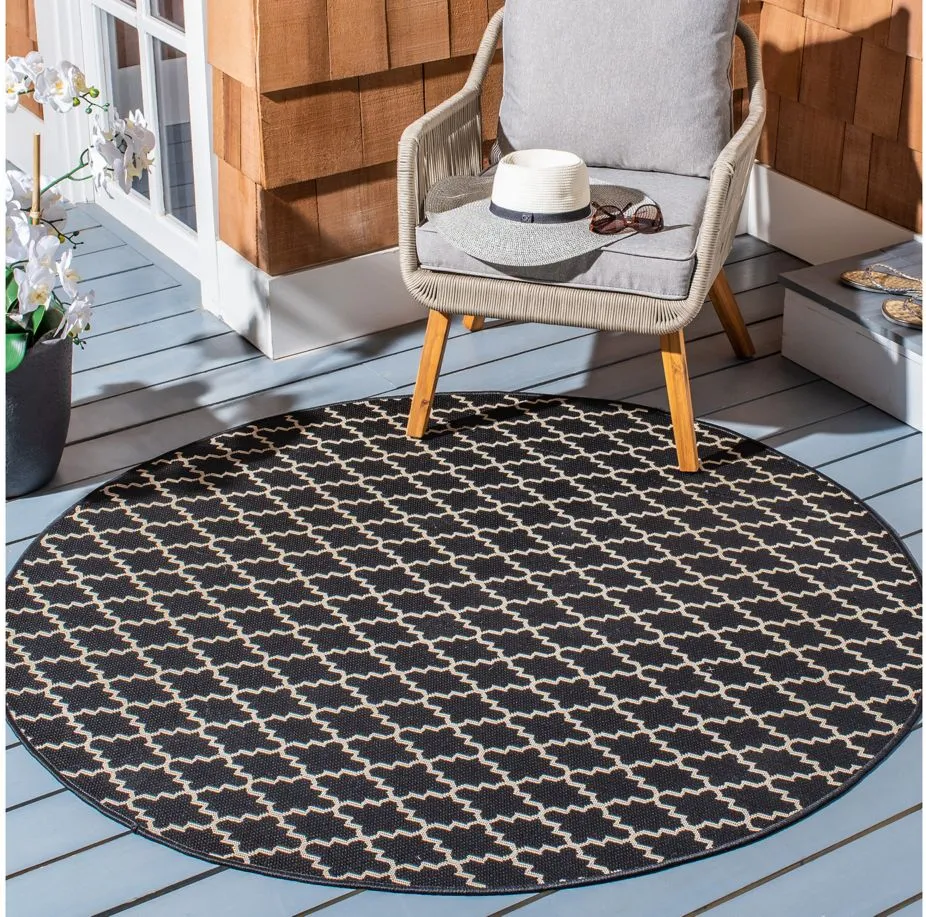 Courtyard Link Indoor/Outdoor Area Rug Round in Black & Beige by Safavieh