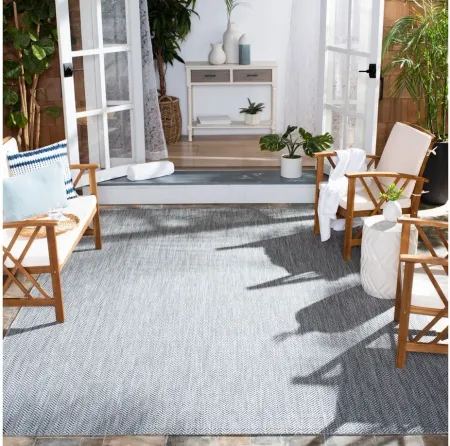 Courtyard Diamond Tile Indoor/Outdoor Area Rug in Gray & Navy by Safavieh