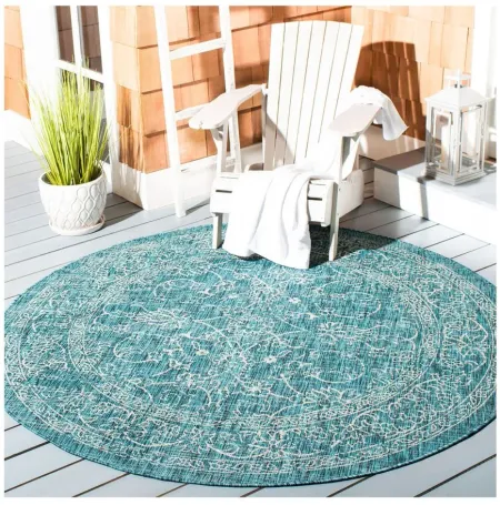 Courtyard Pacific Indoor/Outdoor Area Rug Round in Turquoise by Safavieh