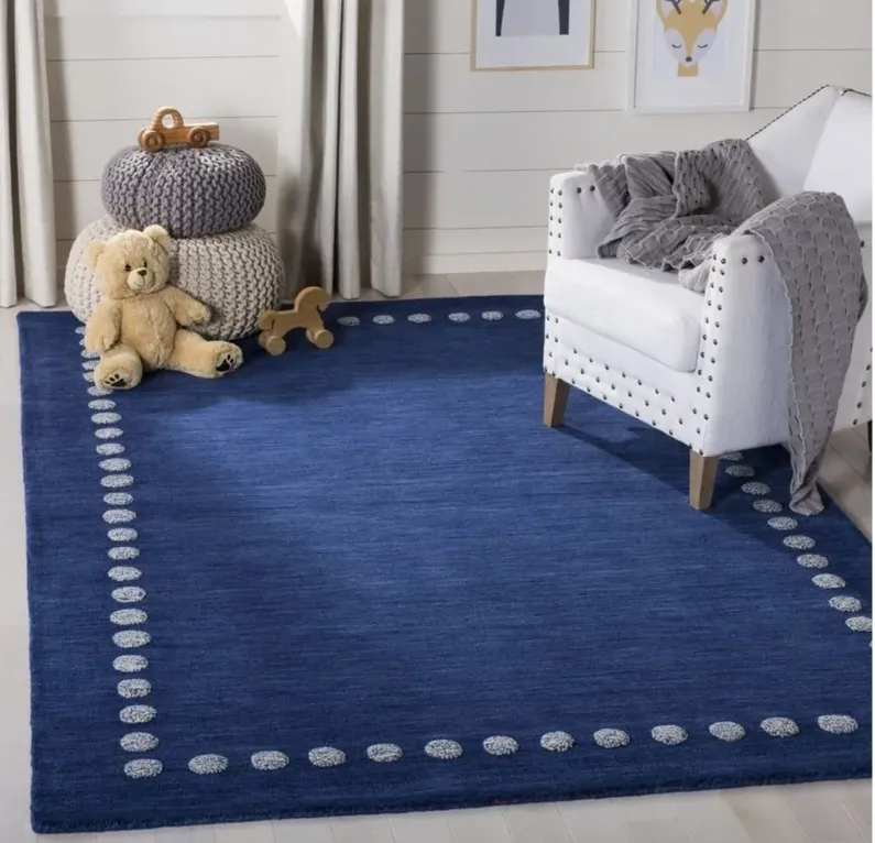 Finnian Kid's Area Rug in Navy by Safavieh