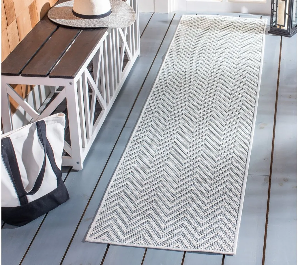 Bermuda Chevron Indoor/Outdoor Runner Rug in Light Blue & Cream by Safavieh