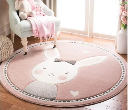 Carousel Bunny Kids Area Rug Round in Pink & Ivory by Safavieh