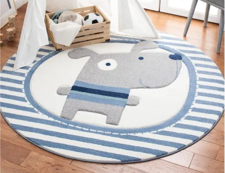 Carousel Puppy Kids Area Rug Round in Ivory & Blue by Safavieh