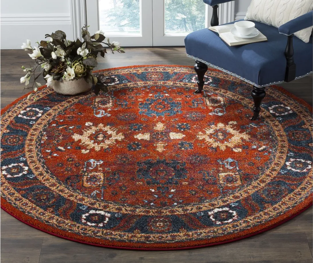 Avicenna Area Rug in Orange & Blue by Safavieh